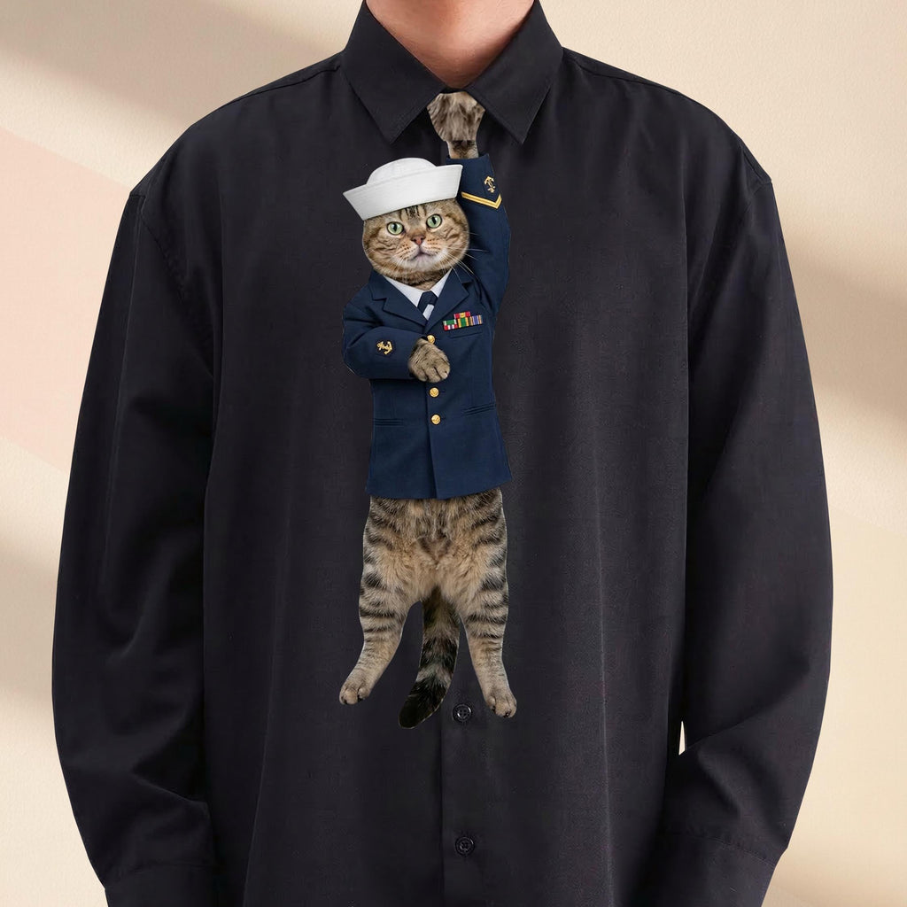 Novelty necktie featuring a tabby cat dressed in a formal blue Navy sailor uniform, complete with a white sailor cap and military ribbons