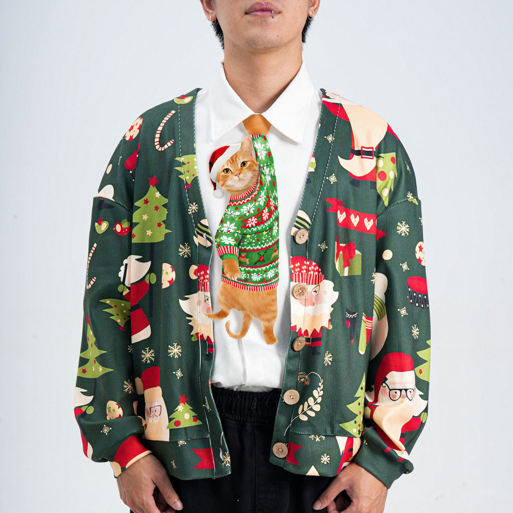 Novelty necktie featuring an orange cat wearing a festive Christmas sweater and Santa hat, a fun holiday fashion accessory.