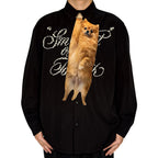 Novelty necktie featuring a realistic hanging fluffy Pomeranian dog design, a fun and unique fashion accessory.