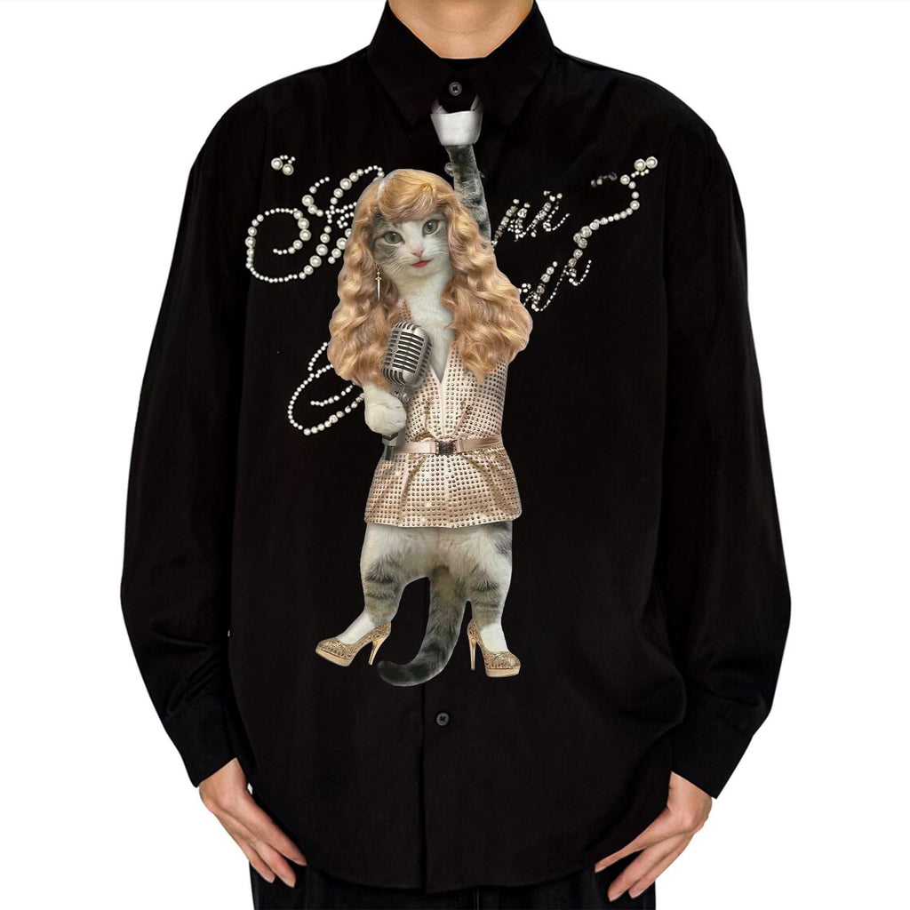 Novelty necktie featuring a cat dressed as a glamorous pop star with long blonde hair, a sparkly outfit, and high heels, singing into a vintage microphone.