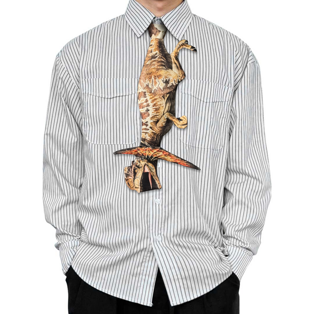 "Novelty necktie featuring a dynamic illustration of a Pterosaur, a unique and eye-catching fashion accessory for fans of prehistoric flying reptiles."