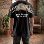 Raccoon ready to blast off 250 years graphic tee by Dripvity, unisex oversized black t-shirt with patriotic raccoon and fireworks design