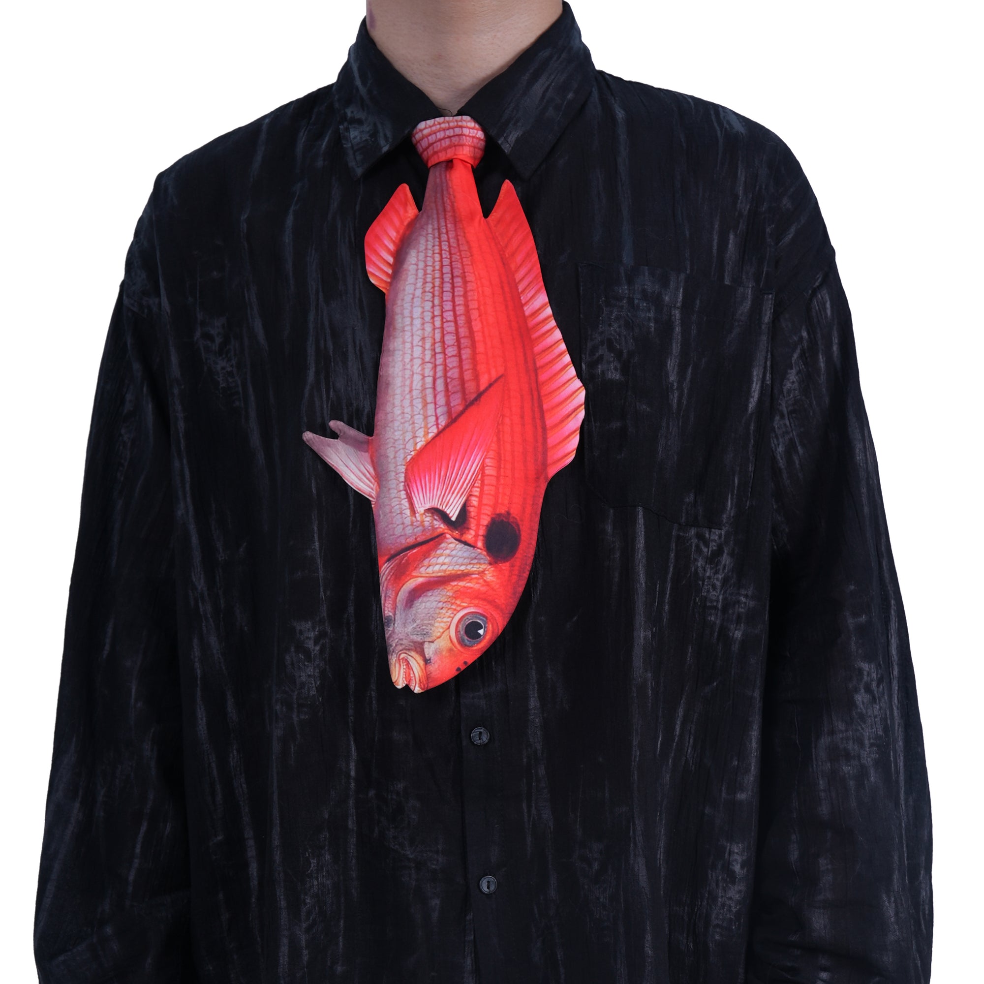 Vibrant red fish-shaped novelty tie, fun and unique accessory for casual wear or themed parties.