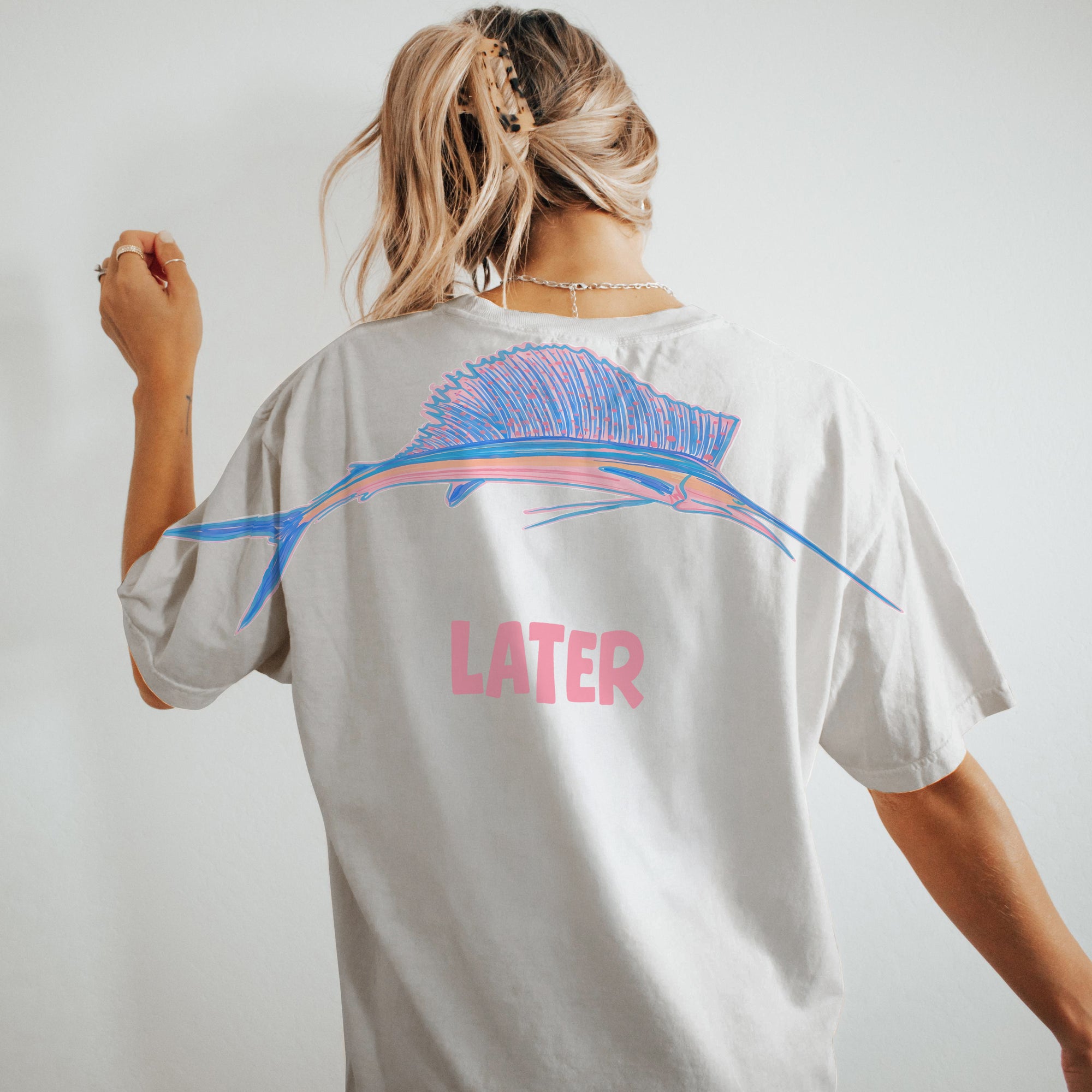 Sailfish Later graphic tee black washed by Dripvity, unisex oversized vintage t-shirt with colorful sailfish print and pink text on back