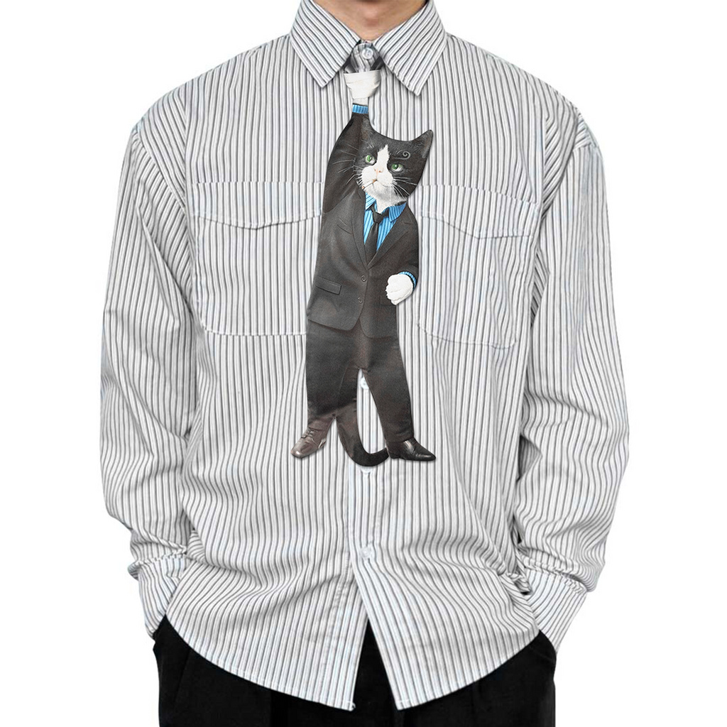 Novelty necktie featuring a creative illustration of a tuxedo cat dressed in a professional black suit, blue dress shirt, and tie, a fun and unique fashion accessory for cat lovers and professionals