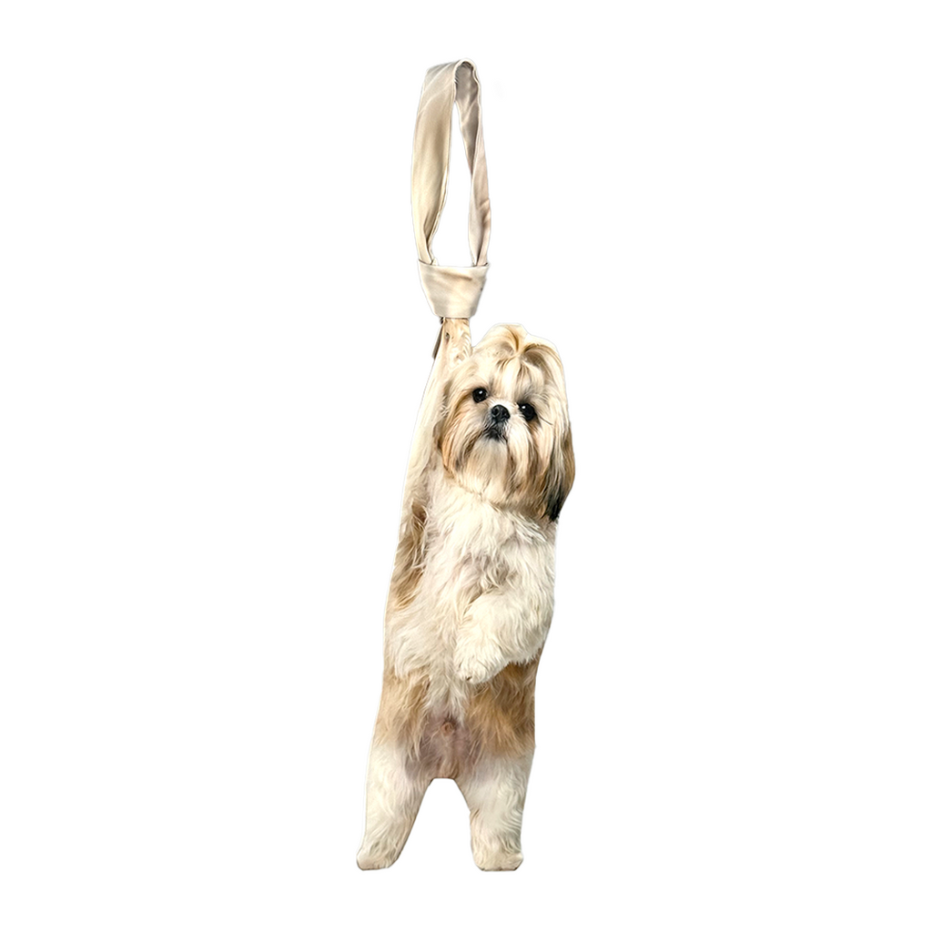 Novelty necktie featuring a realistic hanging Shih Tzu dog design, a fun and unique fashion accessory for dog lovers.