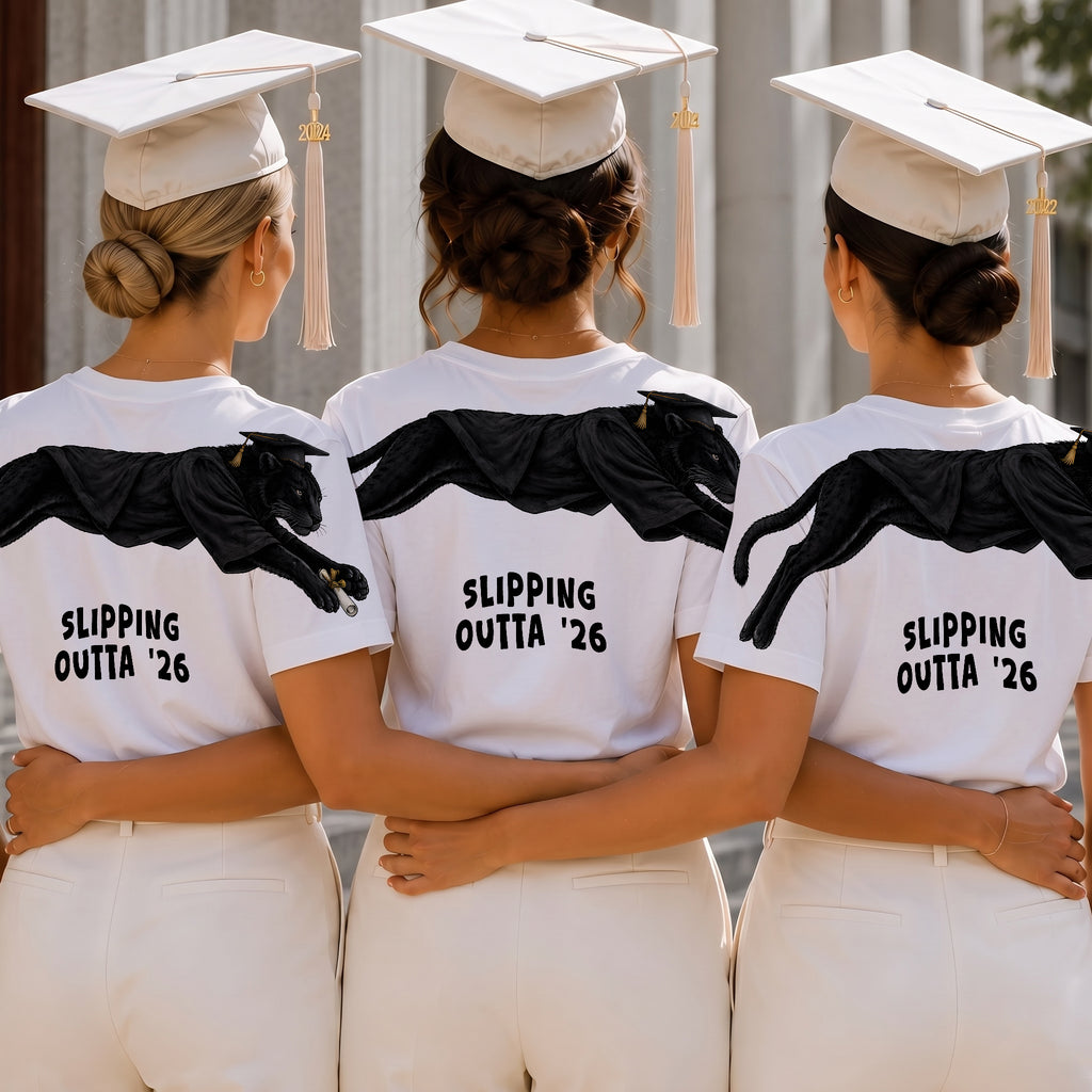 Slipping Outta 26 Panther Graduation Graphic Tee By Dripvity. Edgy unisex oversized black washed t-shirt with leaping panther in graduation cap. Perfect 2026 senior graduation streetwear gift. Shop now!