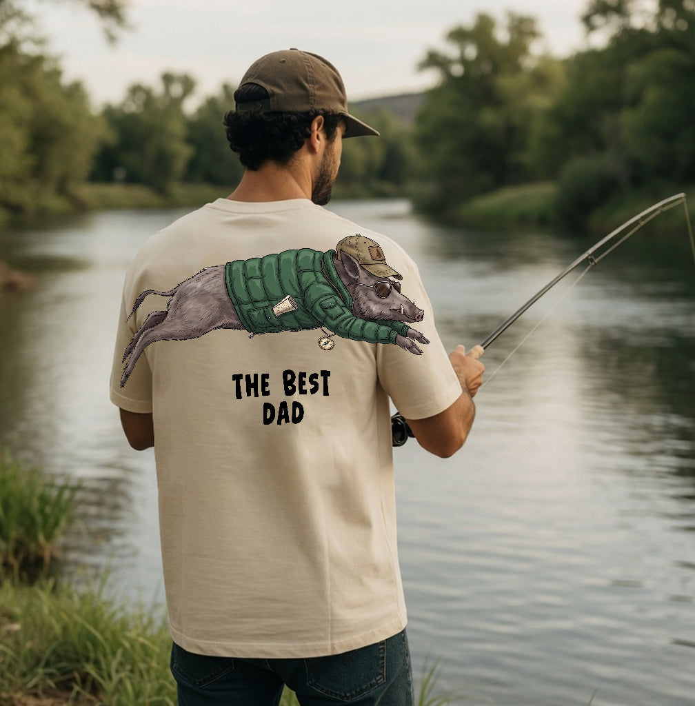The Best Dad wild boar graphic tee funny fathers day by Dripvity, unisex oversized white t-shirt with adventurous boar wearing jacket and cap design