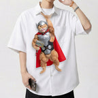 Novelty necktie featuring a muscular ginger cat dressed as Thor, wearing silver armor, a red cape, and holding a hammer decorated with a fish design.