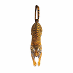 Novelty necktie featuring a realistic hanging tiger design, a bold and unique fashion accessory.