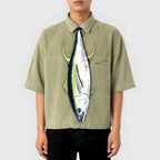 Novelty necktie shaped like a tuna fish, featuring realistic details including fins and scales