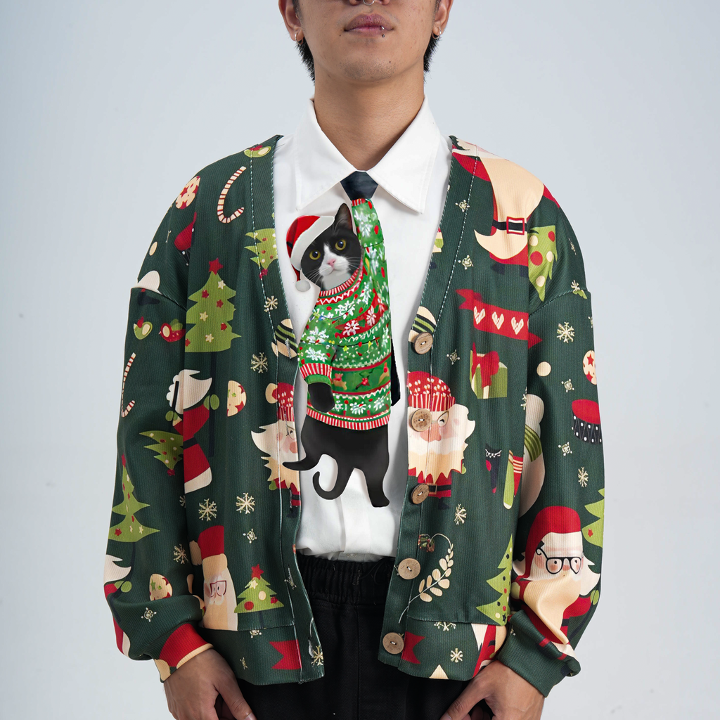 Novelty necktie featuring a tuxedo cat wearing a festive Christmas sweater and Santa hat, perfect for holiday-themed fashion.
