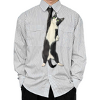 Novelty necktie featuring a realistic illustration of a black and white tuxedo cat, a playful and unique fashion accessory for cat lovers.