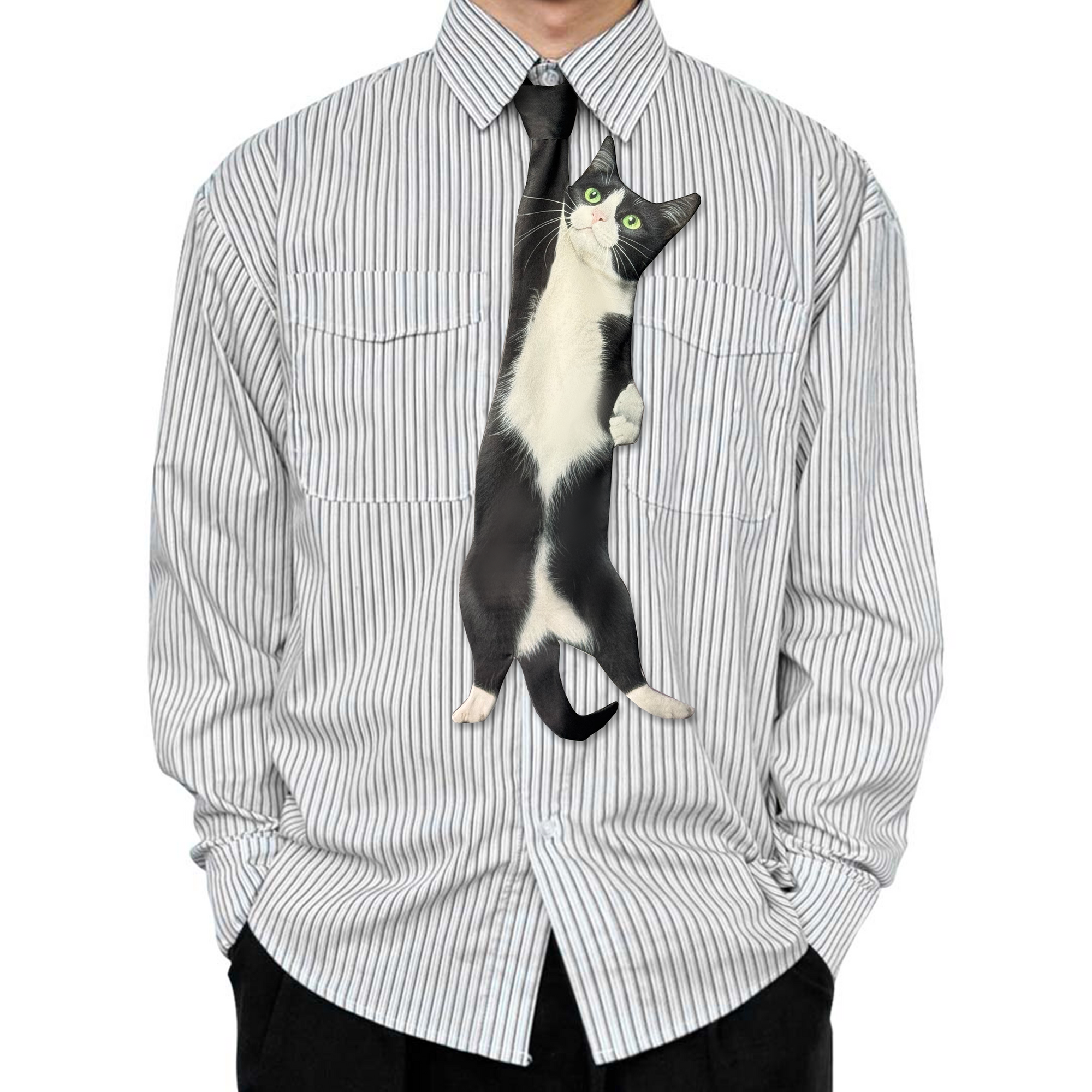 Novelty necktie featuring a realistic illustration of a black and white tuxedo cat, a playful and unique fashion accessory for cat lovers.