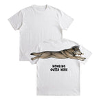 Wolf Howling Outta Here graduation graphic tee by Dripvity, unisex oversized white t-shirt with leaping wolf in graduation cap and diploma