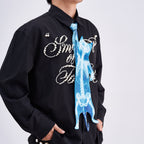 Unique novelty necktie featuring a blue X-ray skeleton design of a cat, an edgy and artistic fashion accessory.