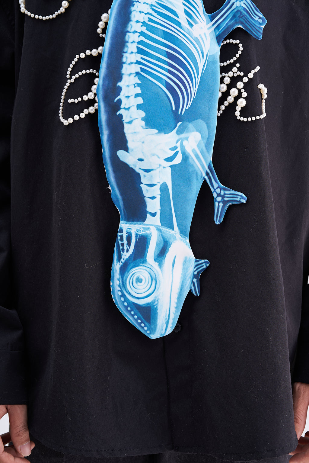 Unique novelty tie featuring a blue X-ray skeleton design of a chameleon, an edgy and artistic fashion accessory for standout looks.