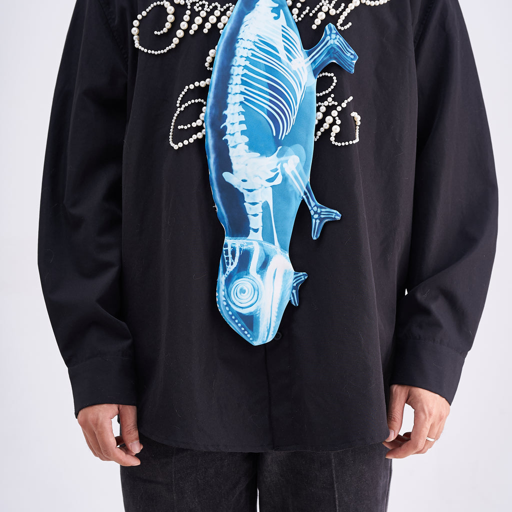 Unique novelty tie featuring a blue X-ray skeleton design of a chameleon, an edgy and artistic fashion accessory for standout looks.