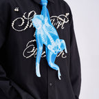 Unique novelty tie featuring a blue X-ray skeleton design of a monkey, a bold and edgy fashion accessory for creative outfits.
