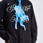 Unique novelty tie featuring a blue X-ray skeleton design of a monkey, a bold and edgy fashion accessory for creative outfits.