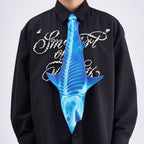 Unique novelty necktie featuring a blue X-ray skeleton design of a shark, a bold and edgy fashion accessory.