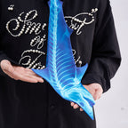 Unique novelty necktie featuring a blue X-ray skeleton design of a shark, a bold and edgy fashion accessory.