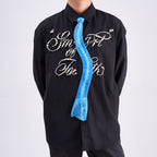 Unique novelty necktie featuring a blue X-ray spine skeleton design, a bold and edgy fashion accessory.